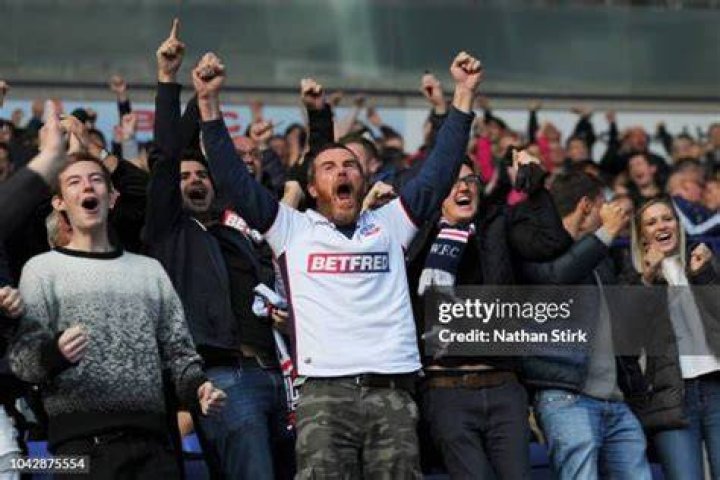 The Bolton fan celebrated after getting the Barnsley fan's number
