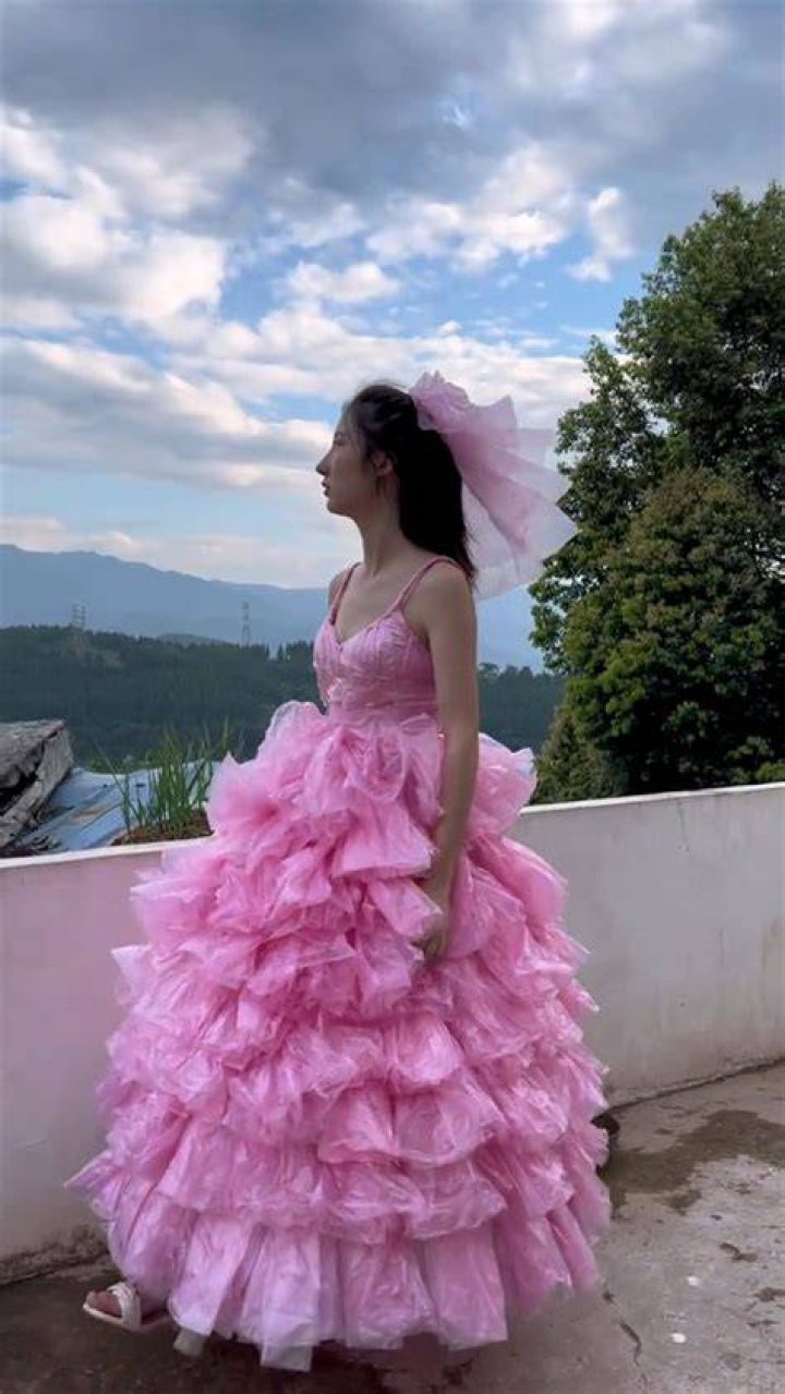 The dress is made from a thick, scuba-style fabric and the website describes it as 'super-smooth and stretchy'