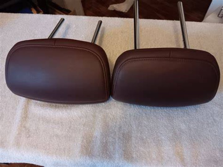 The leather seated headrests have AJ's signature on too