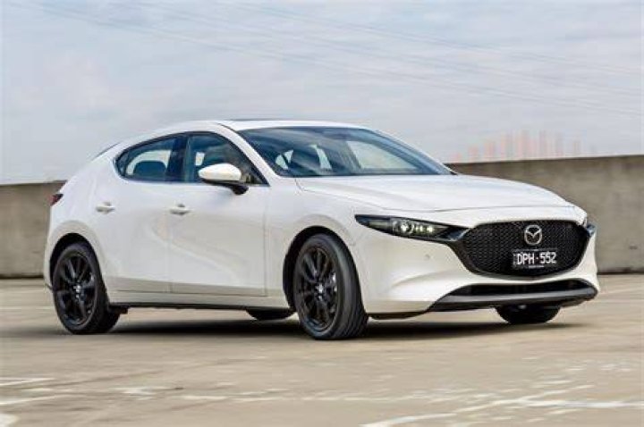 The Mazda 3 comes with heads-up display, adaptive cruise control and Apple Car Play all as standard - not bad