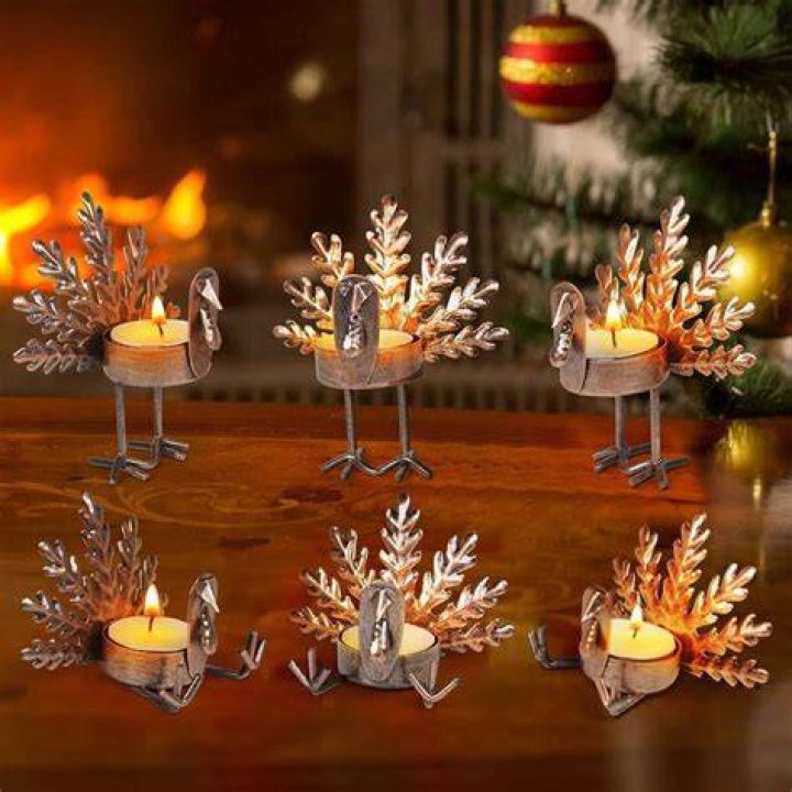  These candle light decorations illuminate the tree beautifully