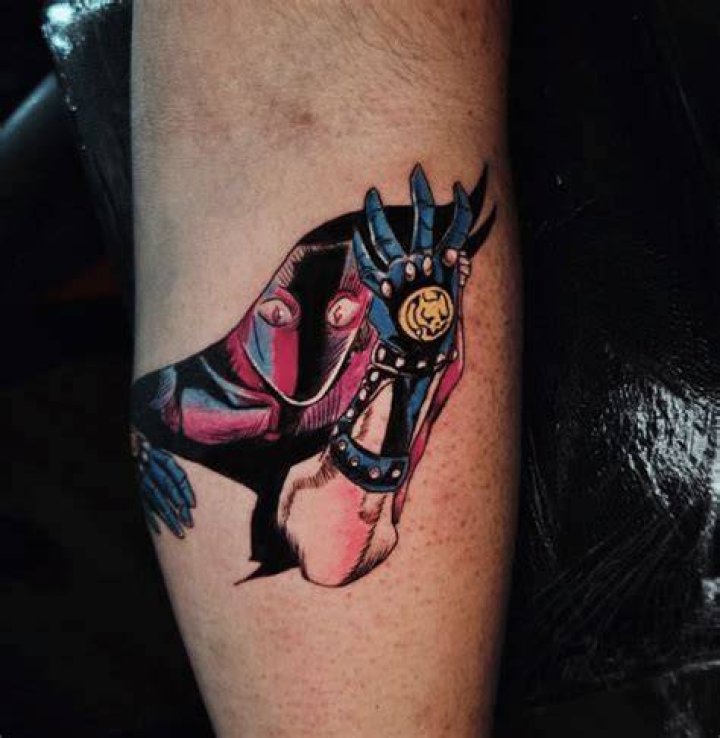  This bizarre tattoo of a slice of pizza is decorated with the words 'life's not out to get you'...