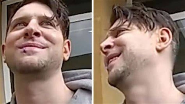  This bloke smirks as he flaunts his tattoo of a baby on its knees, letting one rip