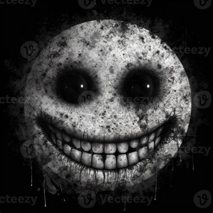  This creepy looking smiley has burgundy AND black teeth