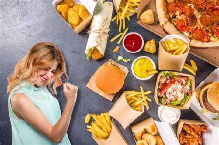  This fast food fan's feet seem to have found agreement on condiments and toppings