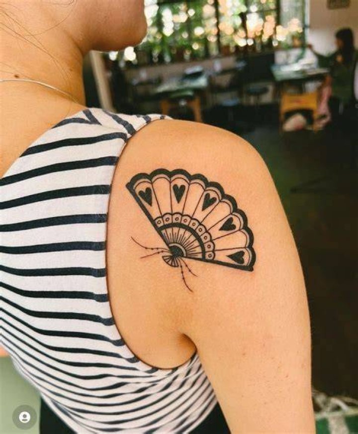 This tattoo fan looks strikingly proud to flaunt his 'white and nerdy' tattoo, but the onlooker is horrified he looks like it