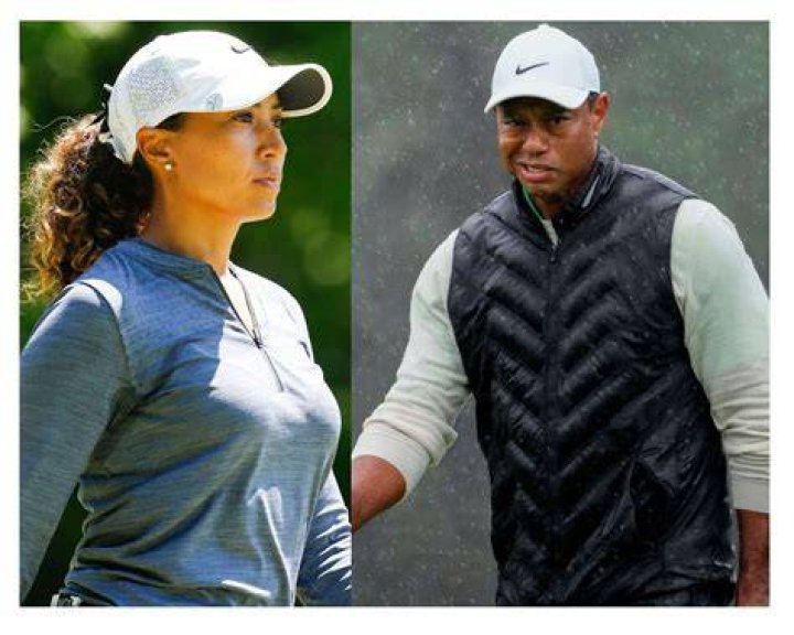  Tiger Woods is soaked with sweat next to Bubba Watson at the Ryder Cup opening ceremony