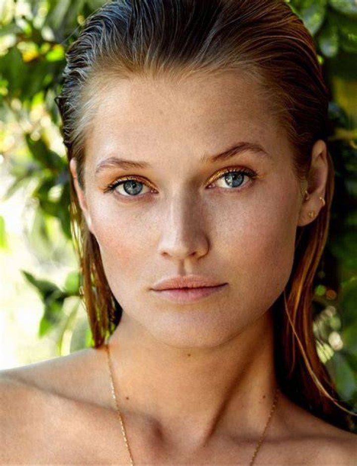 Toni sizzles in a wet T-shirt