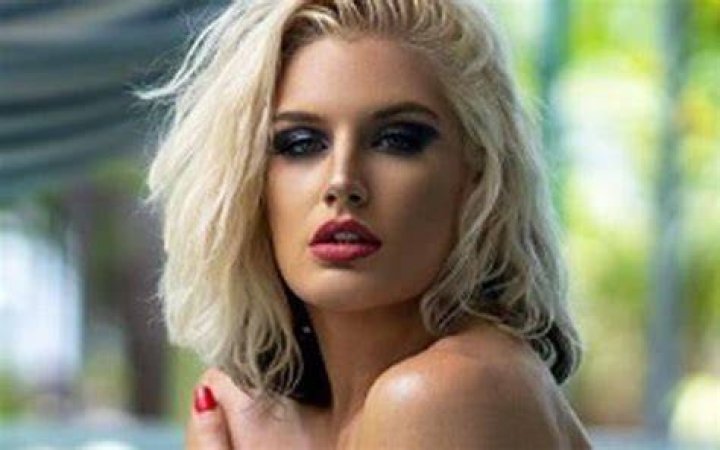Toni Storm poses for Fitness Gurls magazine