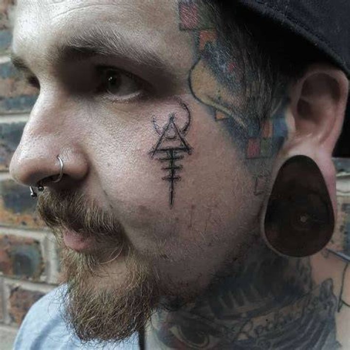 Tribal Face Cheek Tattoo ghostgirltattoo