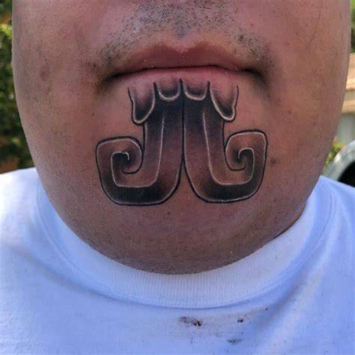 Tribal Face Chin Tattoo thehaletattoo