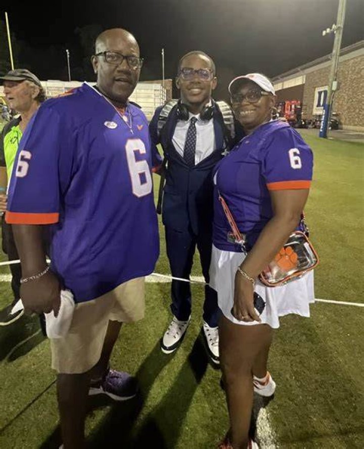 Tyler Brown With His Parents Prior To A Football Match