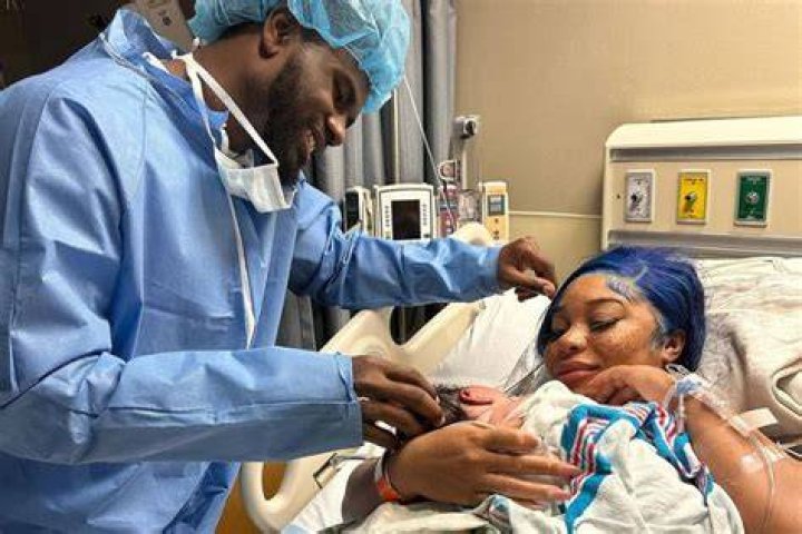 Tyler Huntley With His Scrubs On Meets His Son For The First Time 