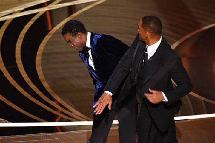 Will Smith slapping Chris Rock.