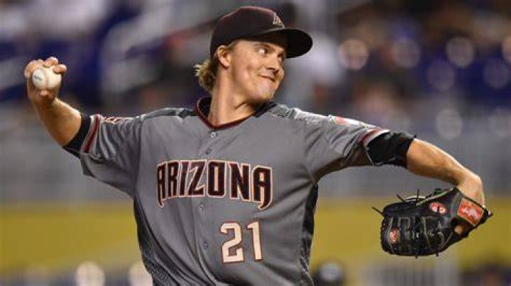 Zack Greinke with his precious award